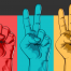 Three hands against a tri-colored background, each depicting a different sign for SEO logo concepts: the first is a finger pointing up, the second is making a peace sign, and the third is showing the