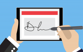 A person digitally signing a document on a tablet using a stylus to optimize their email signature.