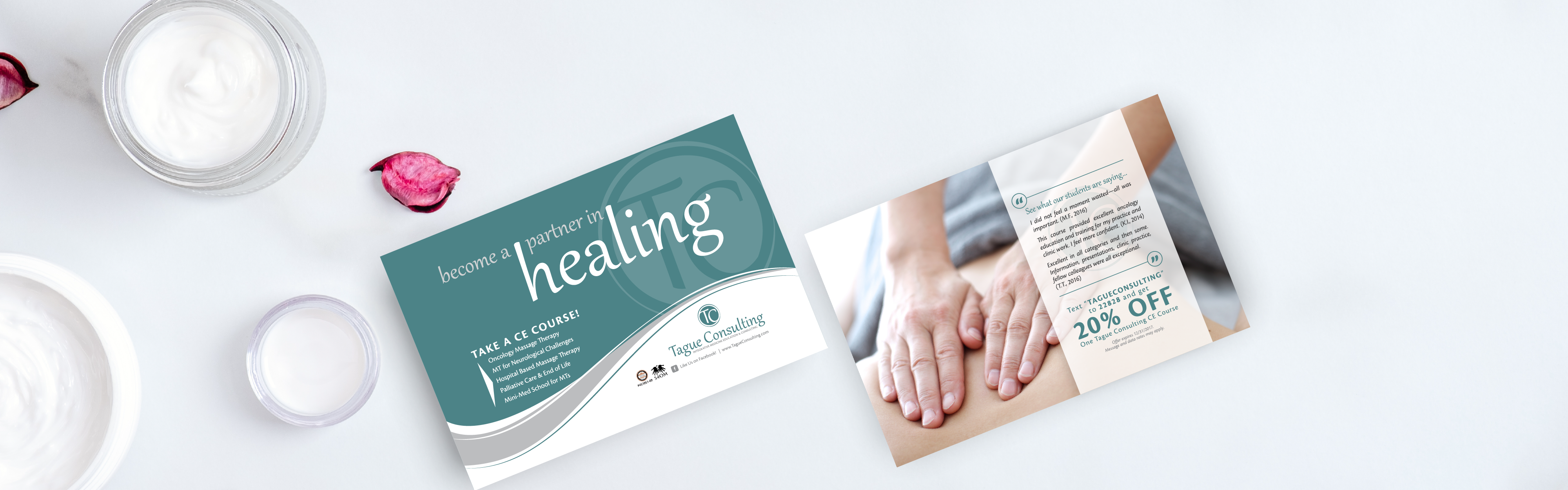 Two promotional brochures for Tague Consulting's healing and wellness service, placed next to a jar of cream and flower petals on a white surface.