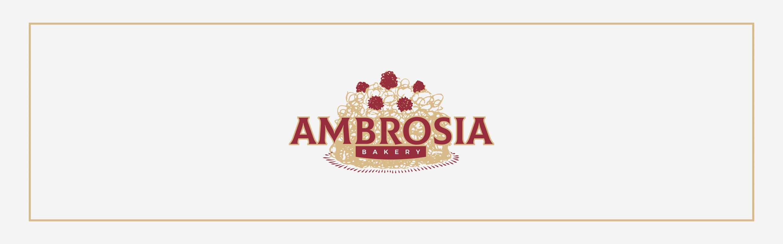 The image displays the logo for "Ambrosia Bakery," featuring stylized text and decorative elements that include what appear to be grapes or berries and leaves. The logo has a classical or vintage appearance.