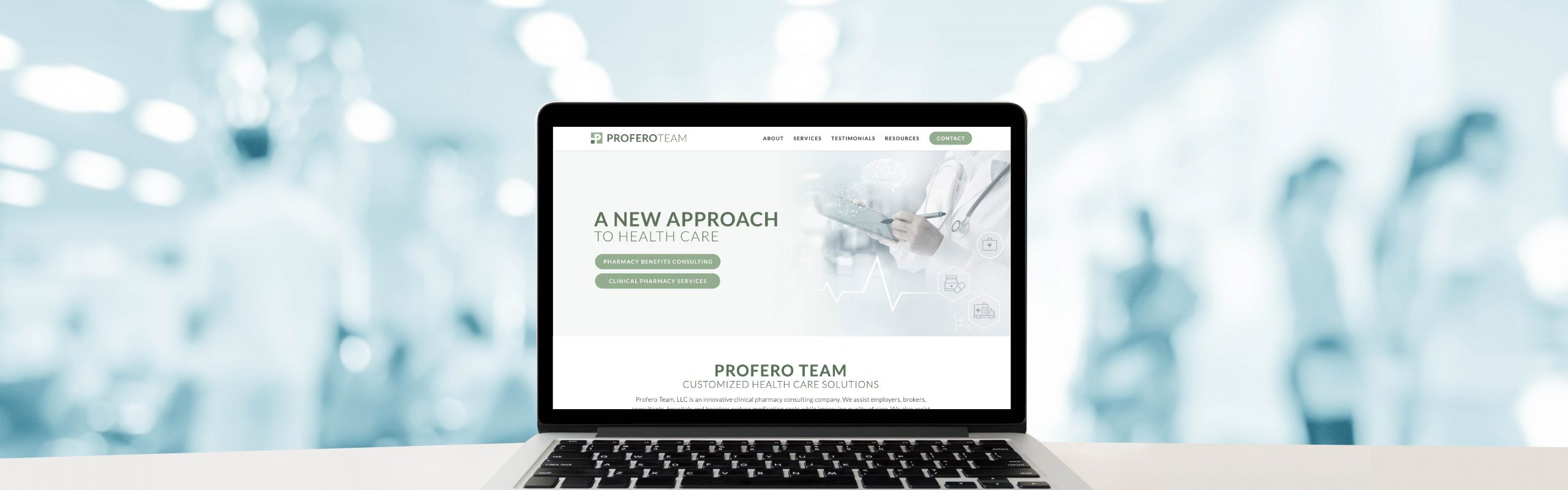 Laptop on a desk displaying a healthcare website with the headline "A new approach to health care, by the Profero Team.
