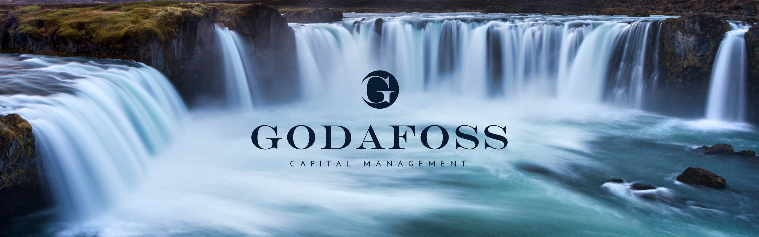 A panoramic view of the Goðafoss waterfall with flowing cascades over a rocky ledge, overlaid with the text "Godafoss Capital Management" and a company logo in the center.
