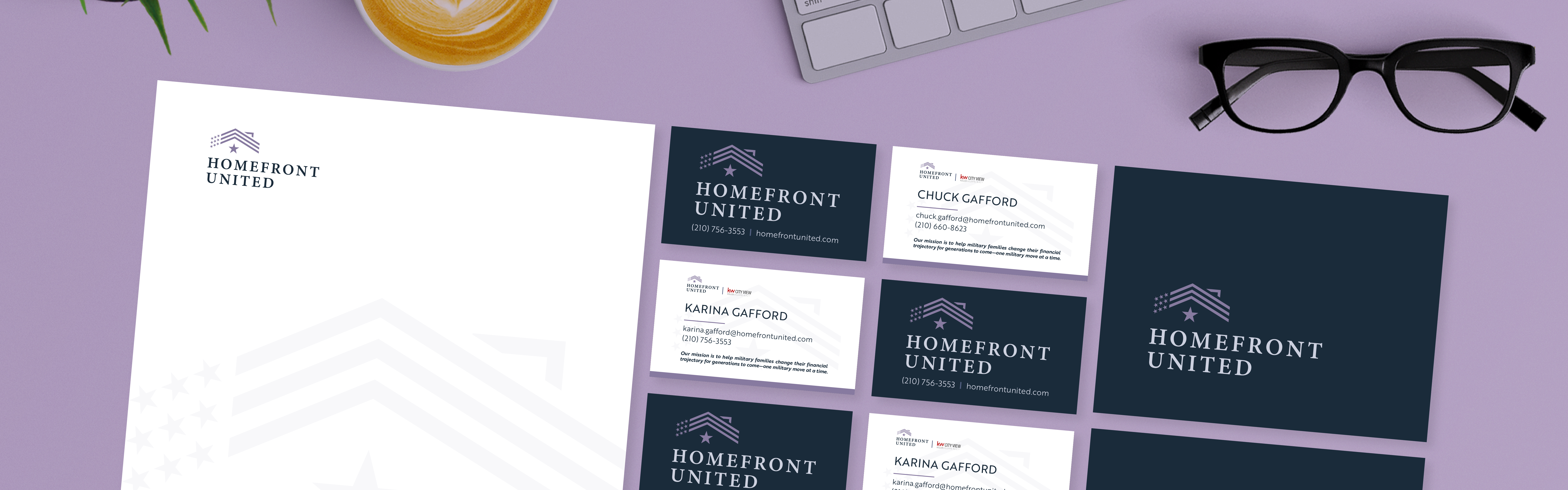 A selection of Homefront United branded stationery items including letterhead, business cards, and an envelope displayed on a purple background with a keyboard, a pair of glasses, and a cup of coffee suggesting