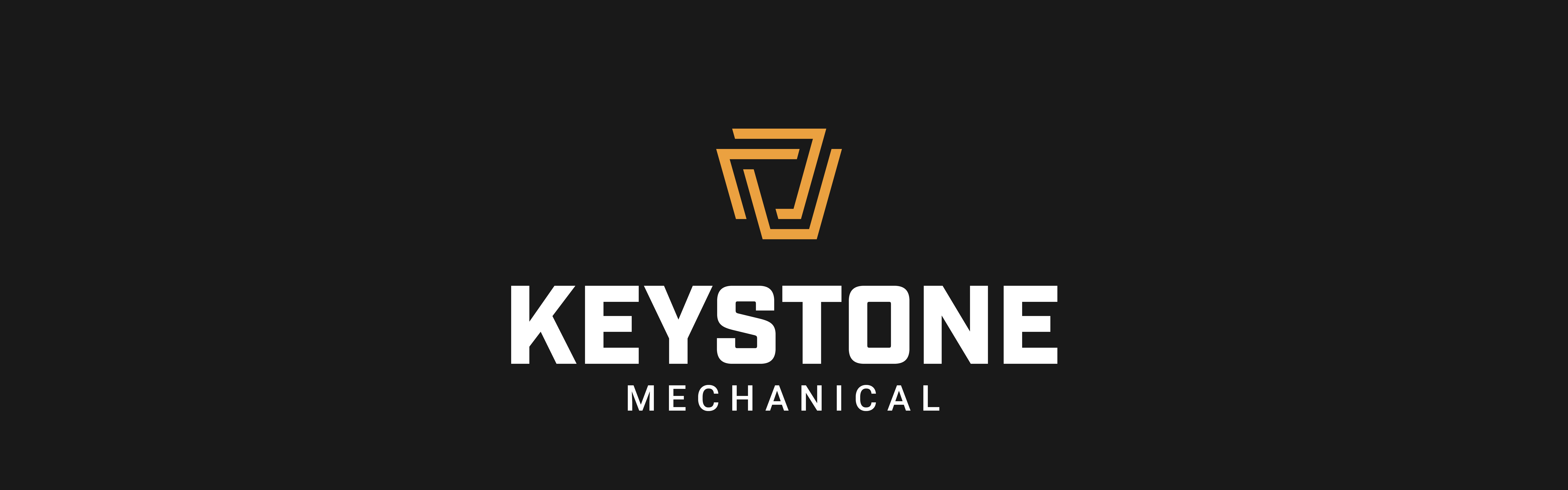 Logo of "Keystone Mechanical" featuring a stylized letter 'K' inside a shield-like icon above the company name, presented on a black background.