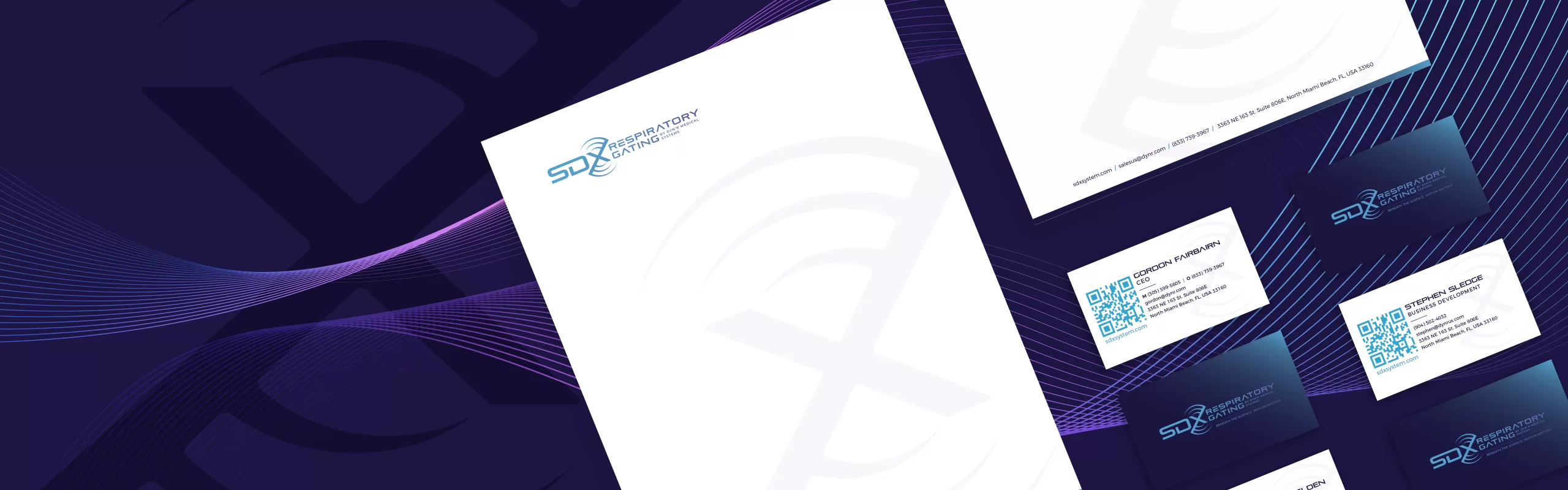 SDX System marketing materials including letterhead and business cards