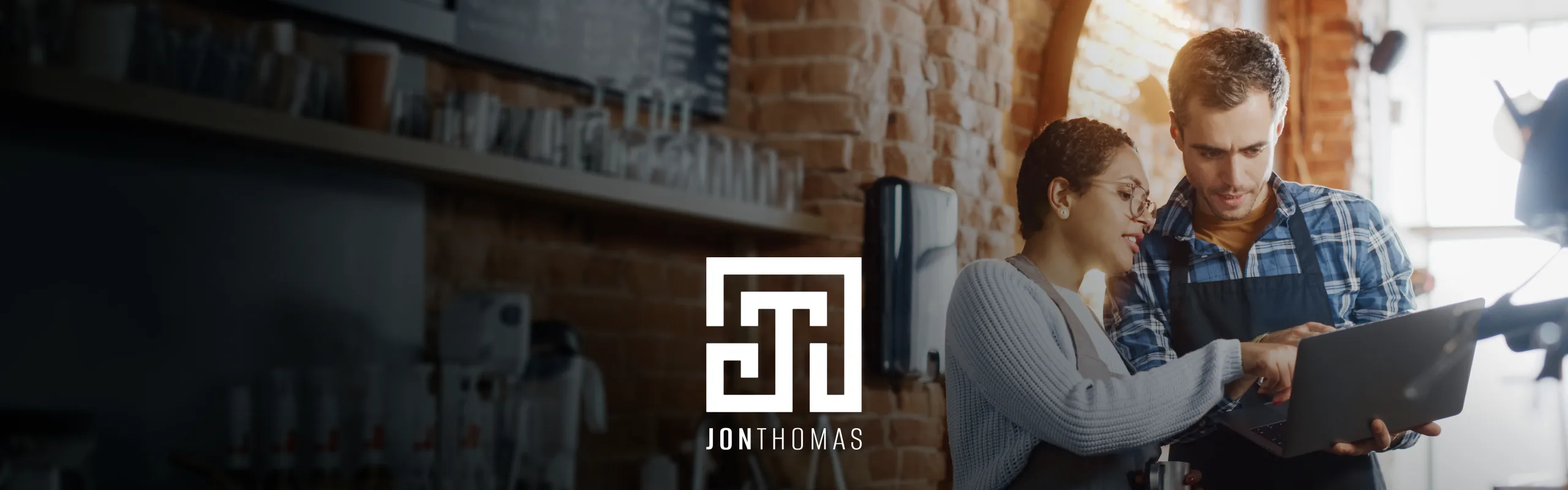 Jon Thomas logo design